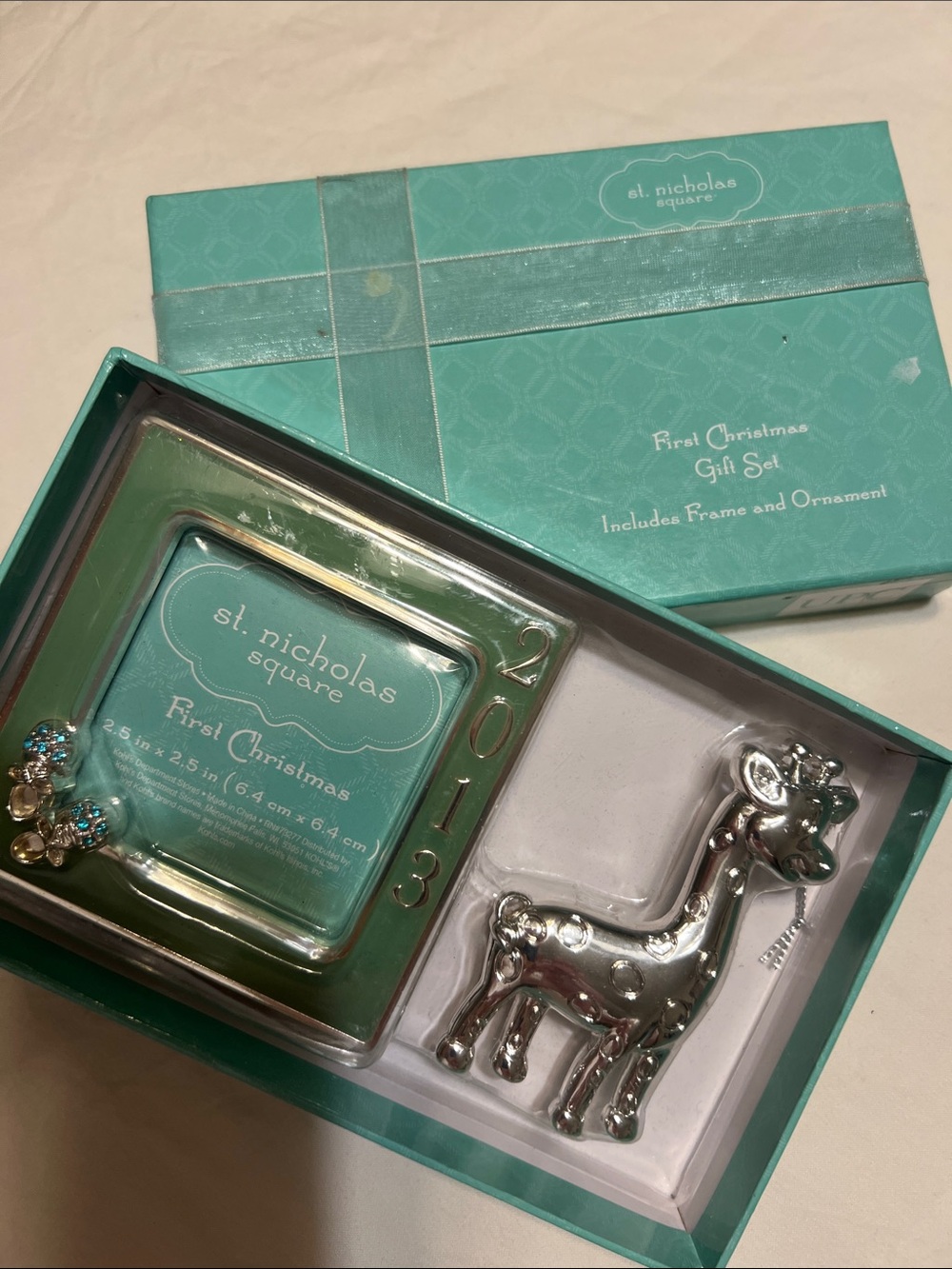 St. Nicholas Square Teal Picture Frame and Silver Giraffe Ornament